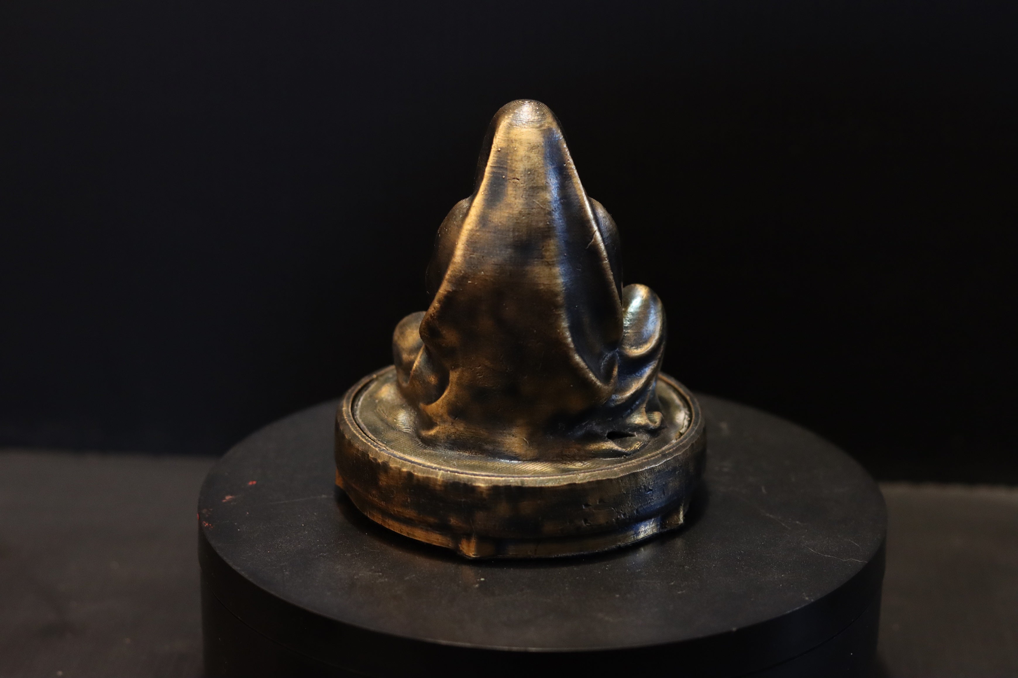 Hollow Bronze Hooded Figure Candlelight Statue